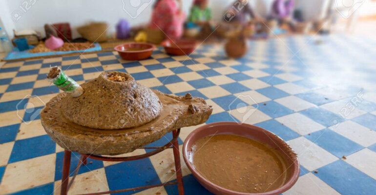 24254172-women-working-in-a-cooperative-for-the-manufacturing-of-argan-fruits-in-essaouira-morocco