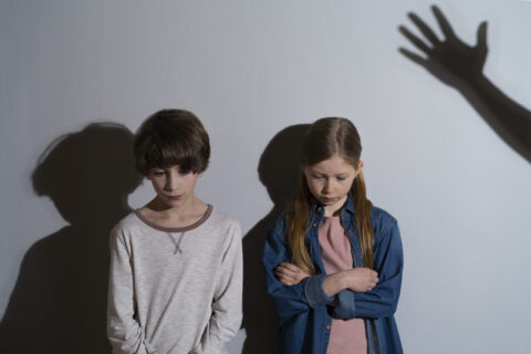 young-child-suffering-abuse-with-shadow