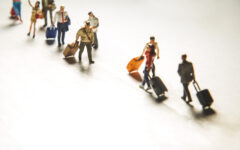 Travelling concepts. Group of traveler miniature