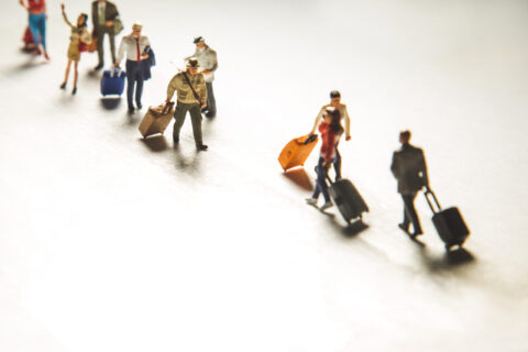 Travelling concepts. Group of traveler miniature