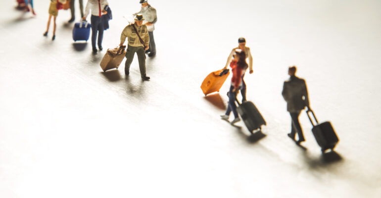 Travelling concepts. Group of traveler miniature