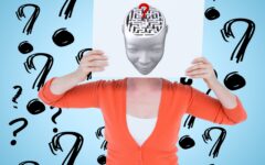 femme-avec-une-affiche-avec-un-dessin-d-une-tete