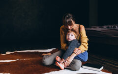 Mother with her son playing in the room