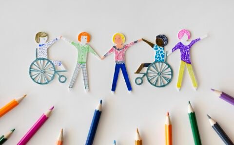 multi-ethnic-disabled-people-community-with-pencils